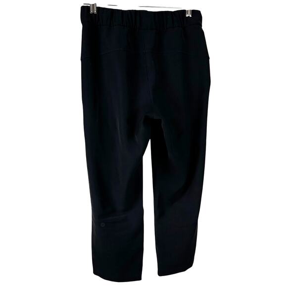 Lululemon On The Fly Crop Woven 23" Black Women's Size 4 Good Used Condition - Picture 5 of 9